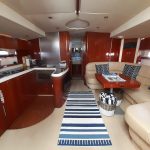 Lady-G_Saloon_galley_view_Mallorca_charter_yacht